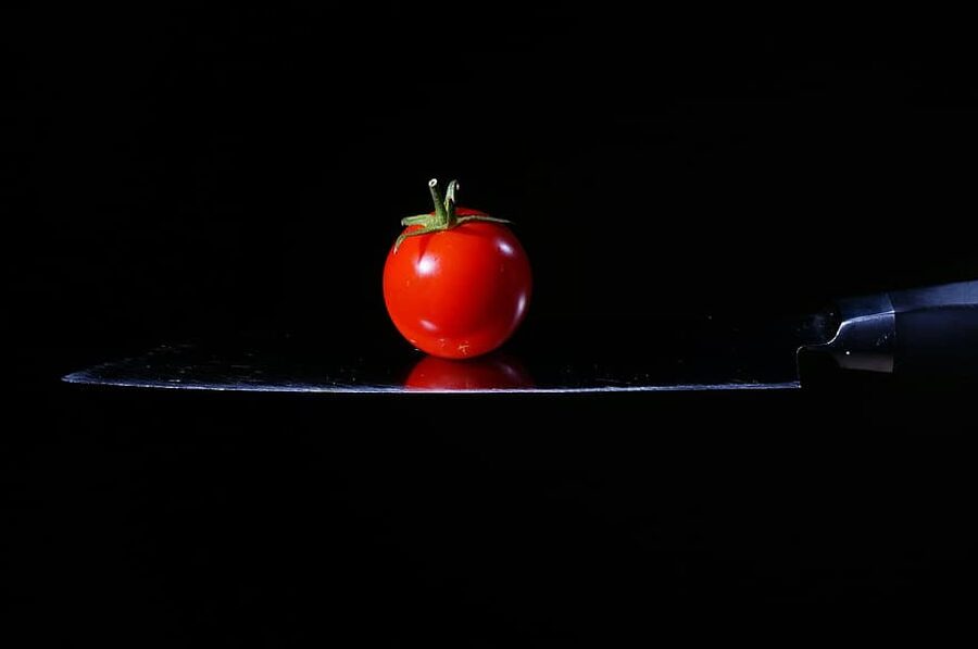 Red cherry. Tomatoes seeds.  Solanum lycopersicum L.