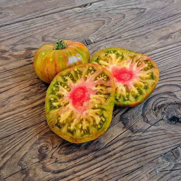 Summer of love. Colorful, large, sweet tomatoes. Tomato seeds.